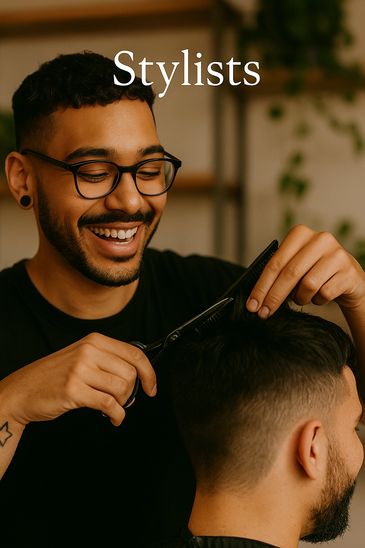 Barber or Stylist cuts client’s hair while growing their brand in Cousin's Styling Studio

