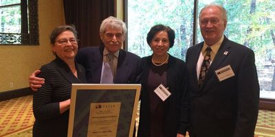 Myron Lasser (2nd from left) receives lifetime achievement award from NYS Trial Lawyers Assoc. 2018