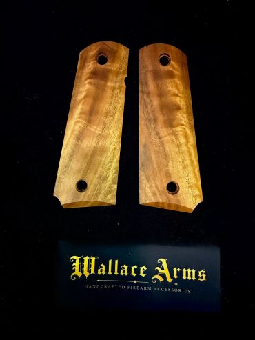 Wooden firearm grips displayed with Wallace Arms branding.