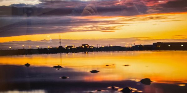 beautiful view of an industrial area along with water view