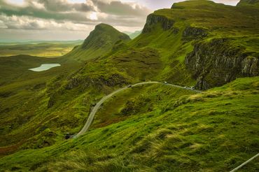 Winding road and odd rock formations on the Isle of Skye
