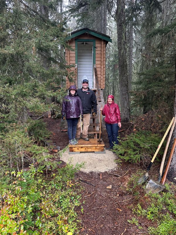 Despite of pouring rain will succeeded finishing the last set of outhouse stairs for Manning Park Re