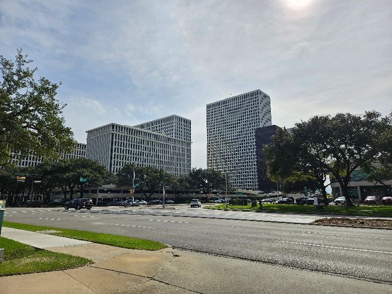 Greenway Plaza in Houston, Texas. Intersection with buildings in background.