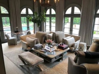 A cream linen sofa sectional in a living room after getting the upholstery cleaned.