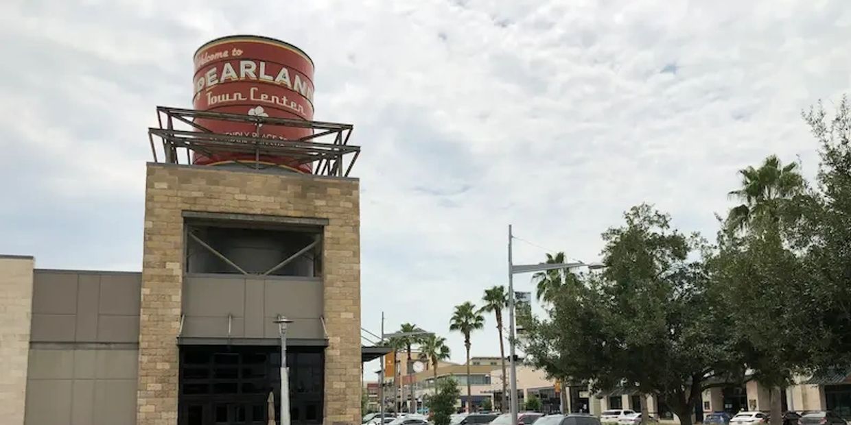 Buildings and a water tower at the Pearland Town Center in Pearland, Texas.