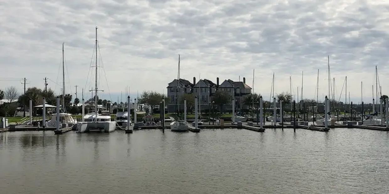 Condos and sailboats on the bay in Seabrook, Texas.