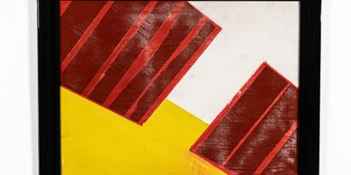 Abstract artwork with red rectangles, yellow and white background in a black frame.