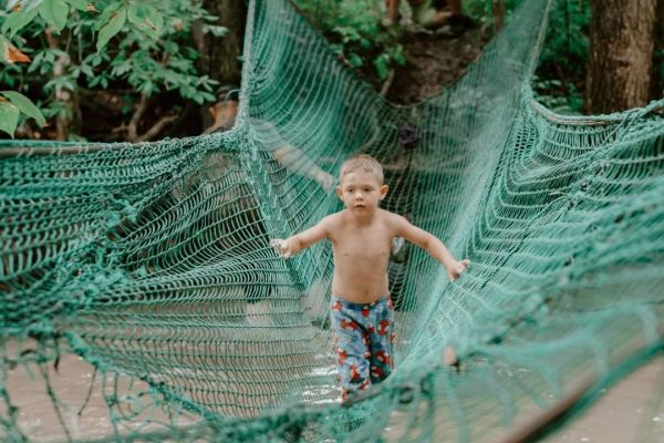 Fun crossing at camp Creek at EarthJOYvillage.org