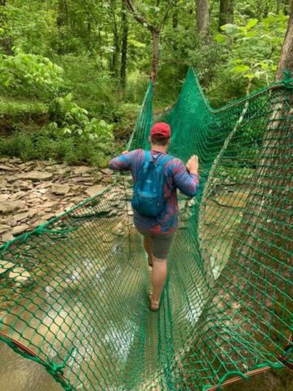 Green net crossing at camp creek. Twenty miles of trails at earthjoy treehouse rentals in kentucky