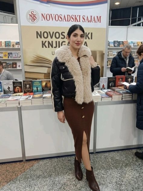 Woman posing at the Novosadski Sajam book fair.