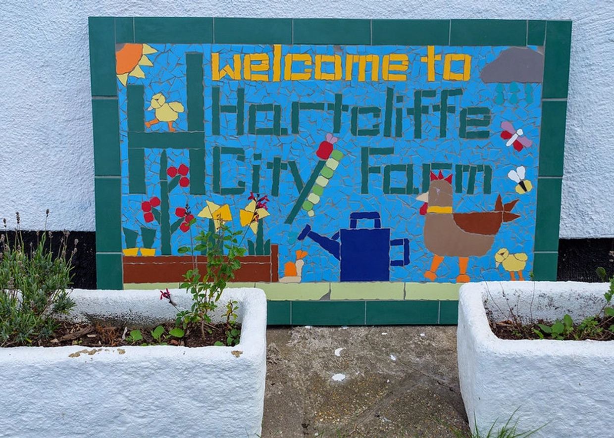 A mural representing Hartcliffe City Farm, a local charity the clinic donates to