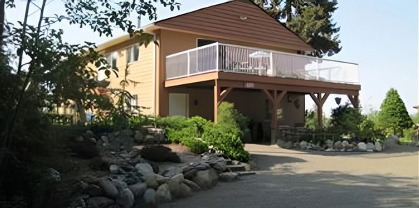 Farm house with greenery outside