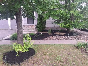 Outdoor landscaping upgrade with fresh mulch