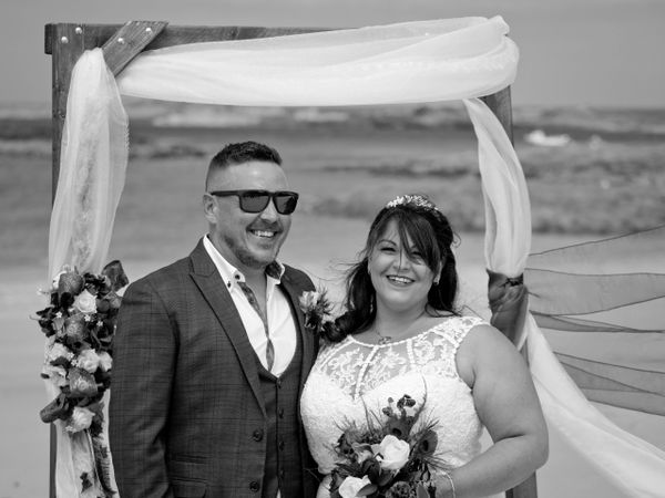 B&W wedding photo on Cobo beach, Guernsey
