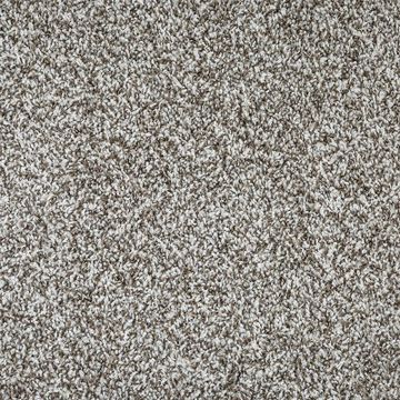 Close-up of textured beige and gray carpet fibers.