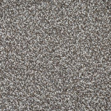 Close-up of a textured carpet with mixed gray and white fibers.