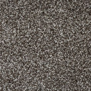 Close-up of textured gray and brown carpet fibers.