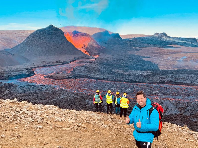 Private Fagradalsfjall volcano tour in Iceland with 2Go Iceland guides overlooking active lava flow and volcanic craters on the Reykjanes Peninsula.
