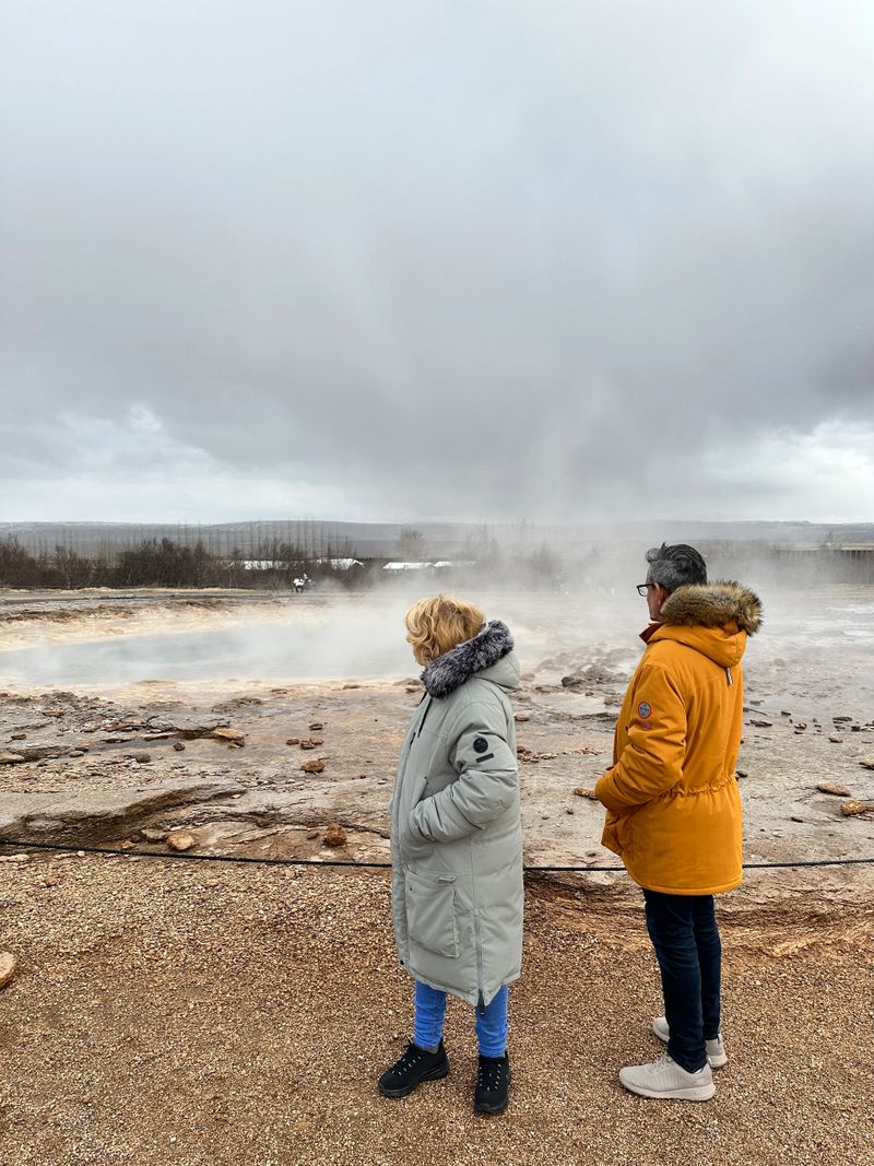 Small group luxury van tour at a geothermal hot spring in Iceland's Golden Circle, featuring local expert guides from 2Go Iceland.