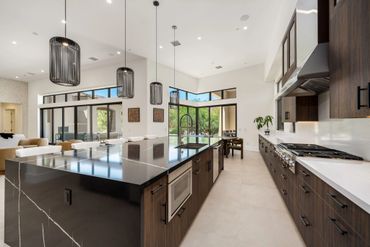 Milano by Cleaf used for custom cabinets in modern kitchen design for custom bedroom in Stone Eagle