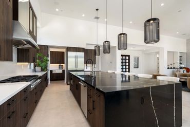 Milano by Cleaf used for custom cabinets in modern kitchen design for custom bedroom in Stone Eagle