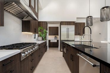 Milano by Cleaf used for custom cabinets in modern kitchen design for custom bedroom in Stone Eagle