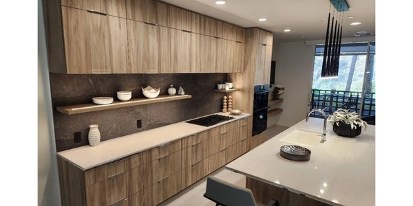Beautiful modern custom kitchen cabinets and floating shelves.