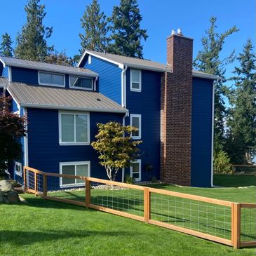 On this project we did windows, siding, and framing the eaves around the house. 