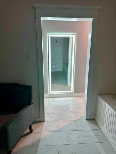 Full-length LED mirror in the bridal suite of The Enchanted Point DFW wedding venue.