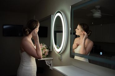 Bride getting ready in the bridal suite