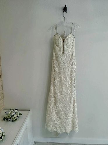Wedding dress hanging in the bridal suite at The Enchanted Point DFW wedding venue