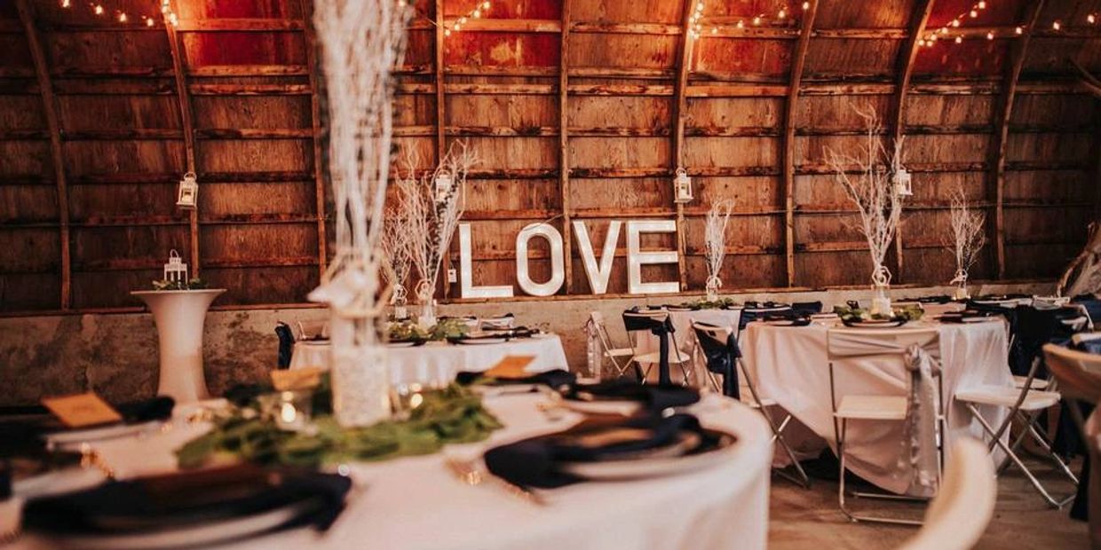 picture of a wedding reception in a barn