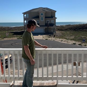 checking workmanship on new porch