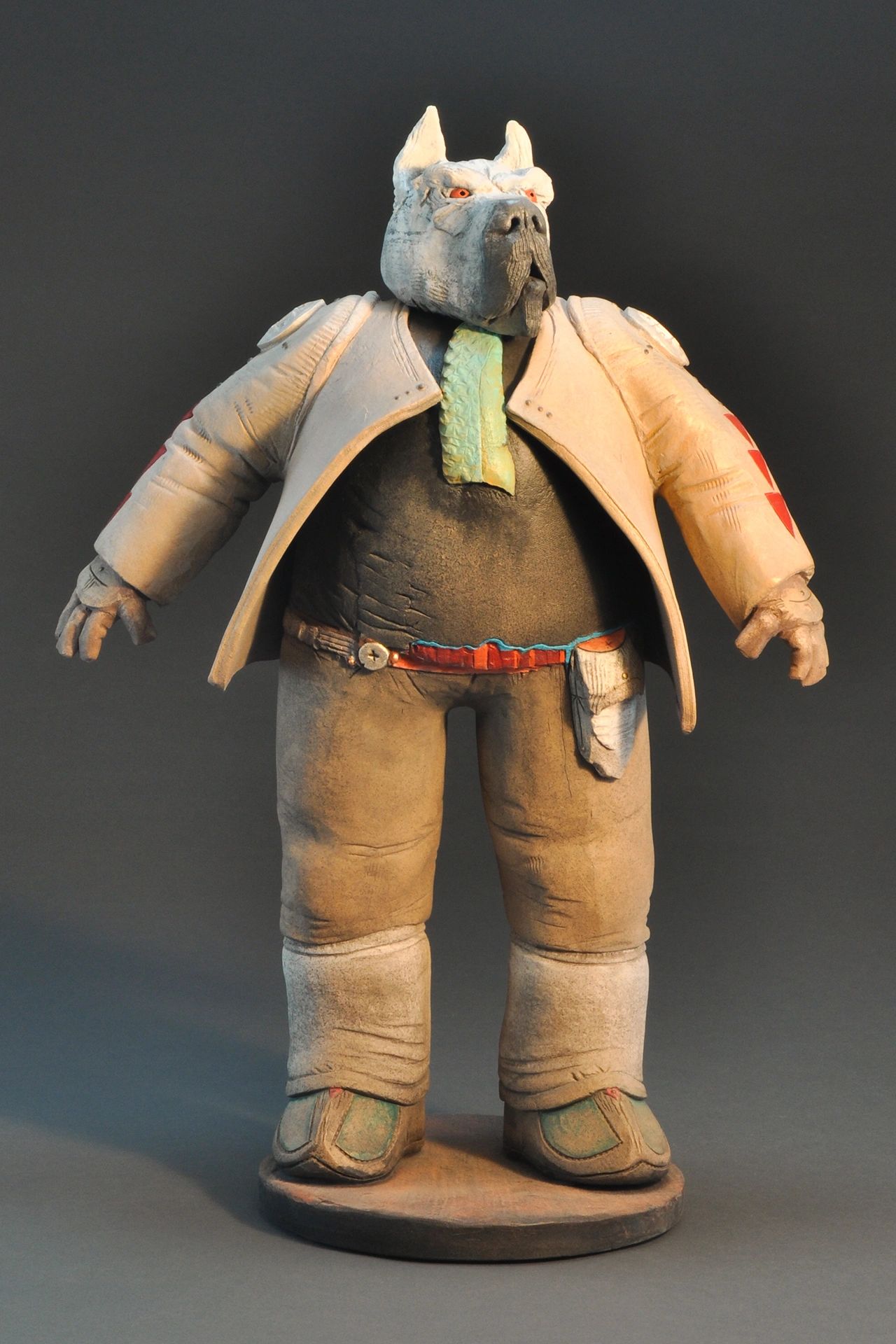 Figurine of a humanoid dog in a suit with a tie.