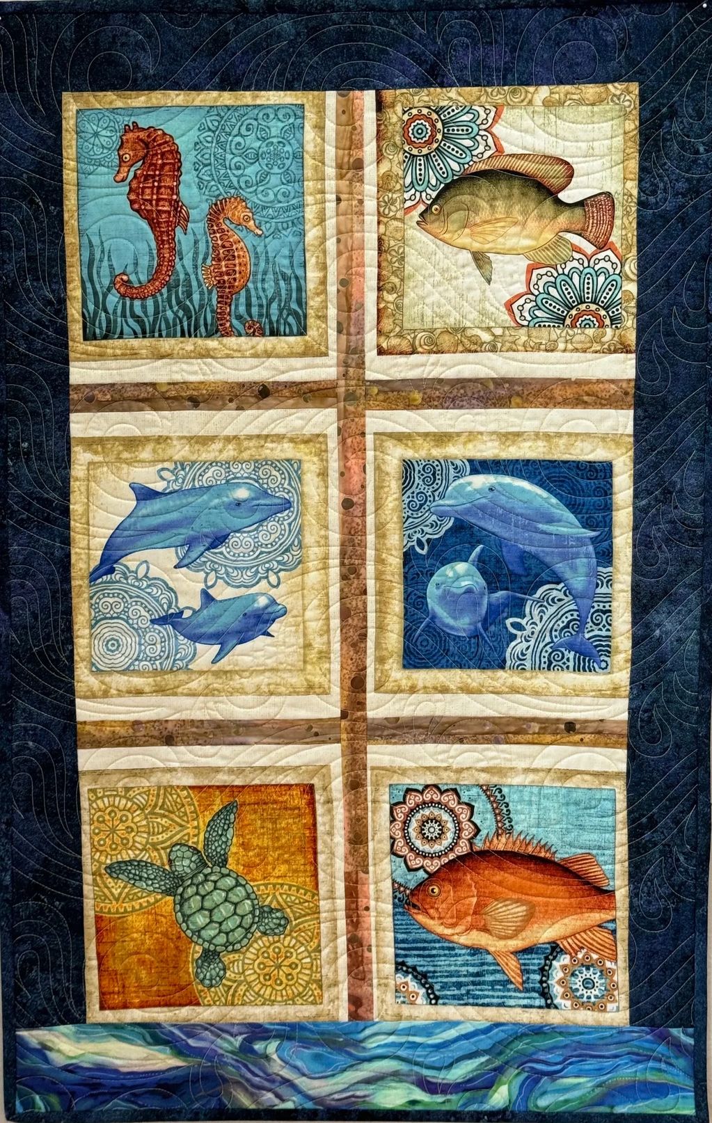 Quilt with sea creatures in a six-panel design.