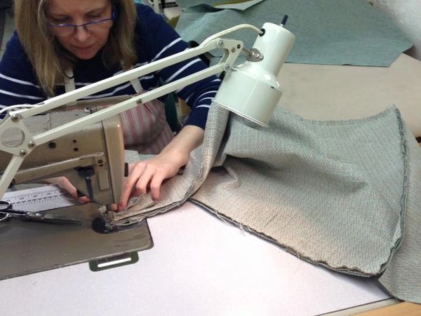 Crafting loose covers with a sewing machine.