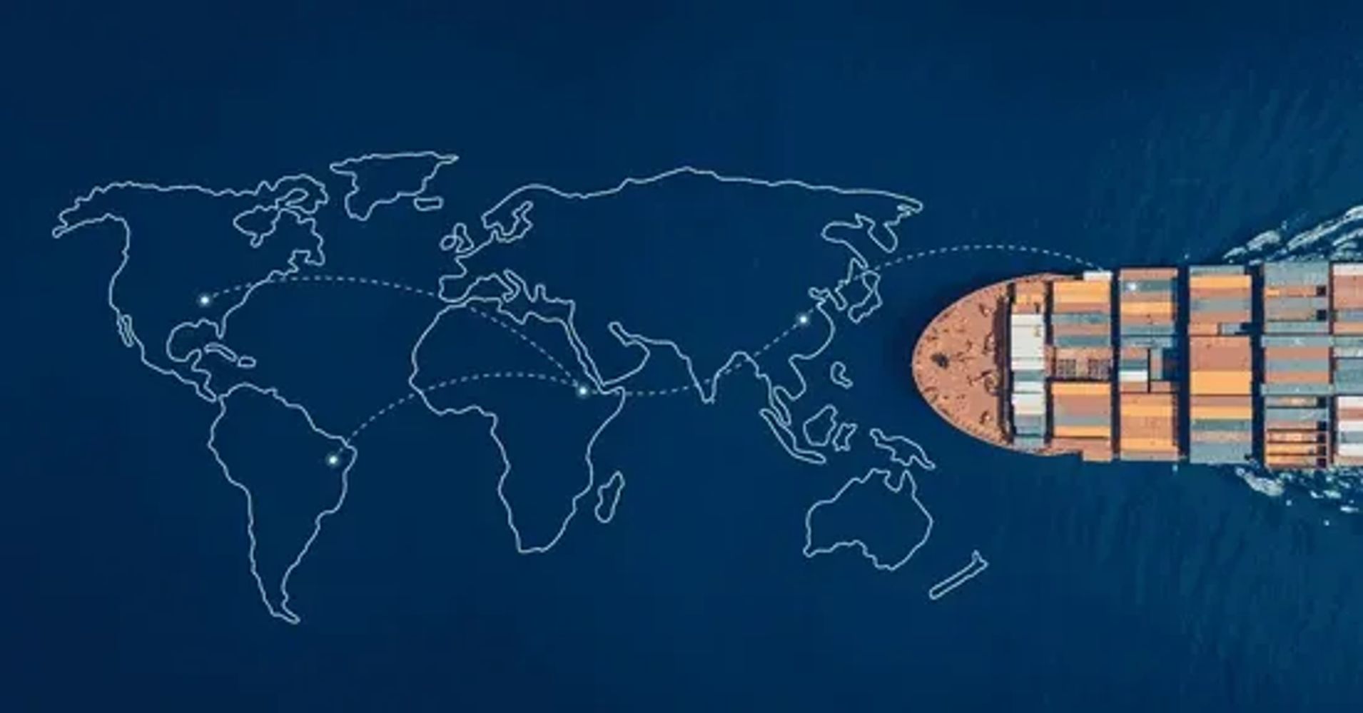 Cargo ship navigating global trade routes on a world map in the ocean.