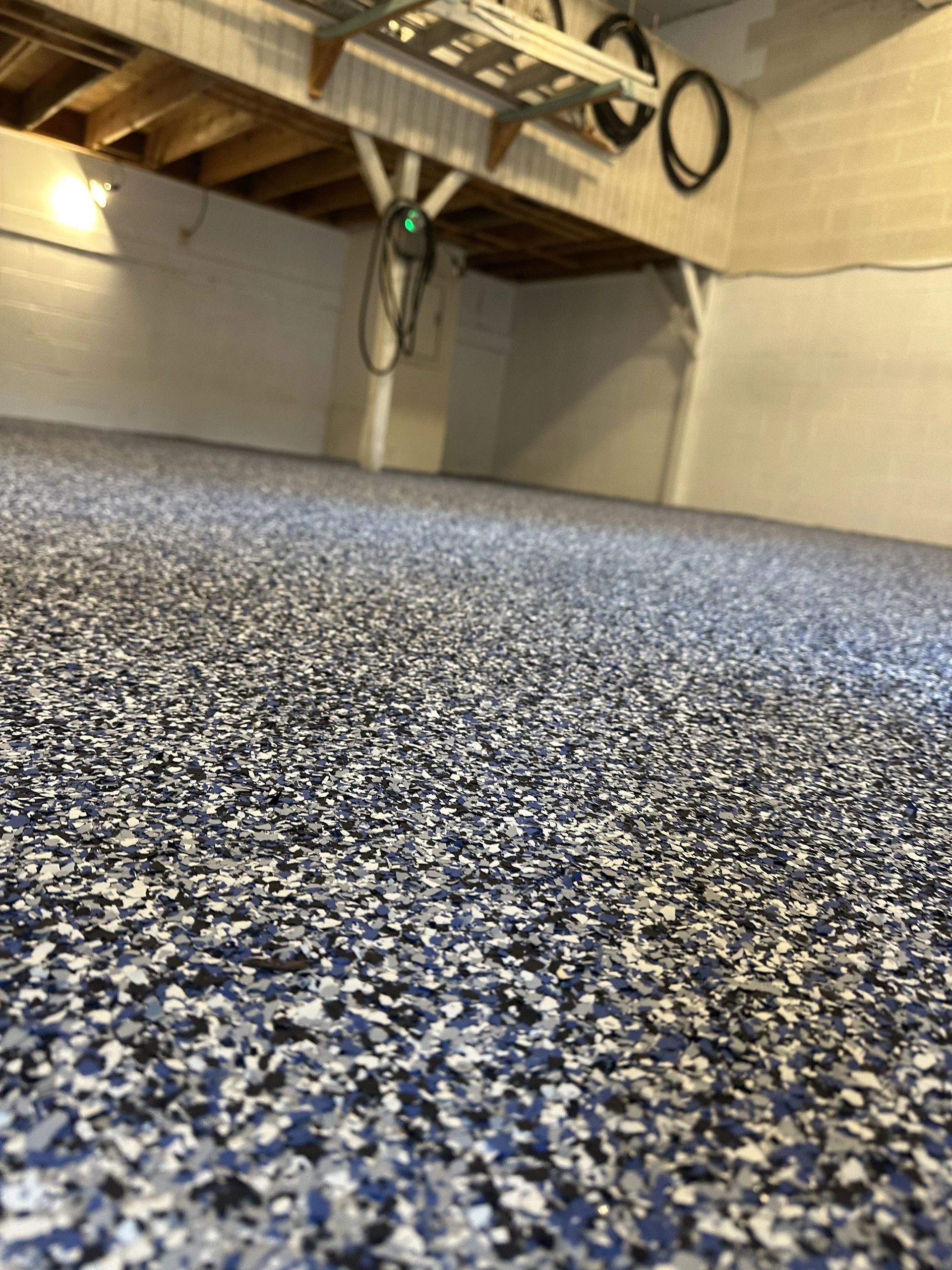 Polyaspartic garage floor coating installed by Mod Garage of Nova in Northern Virginia
