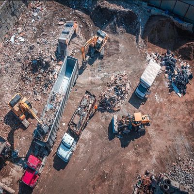 Excavator Loading Waste Into Truck