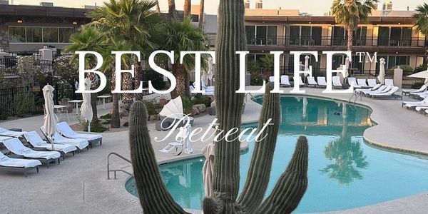 A serene resort pool surrounded by palm trees and cacti with retreat information.