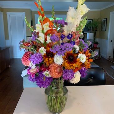 With a background in professional floral design, we will make all types of arrangements for you for 