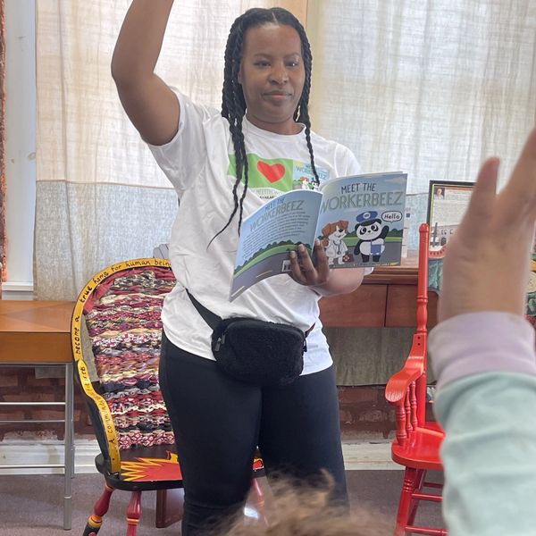 Author & Founder Robin Humphrey doing a reading at Ivanhoe