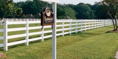 Omaha Fence Company with 4 Rail Vinyl Fence.