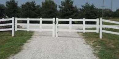 Omaha Fence Company with Double Drive Vinyl Gate.
