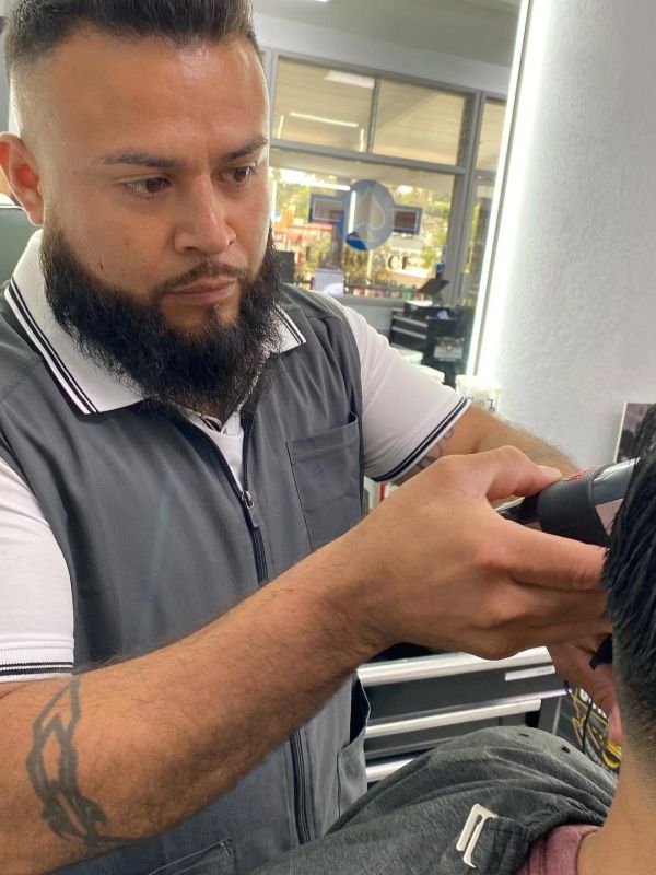 Gil, barber at Lucky Ace