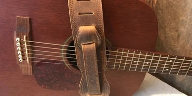 leather guitar straps and mandolin straps with leather picks and pick case