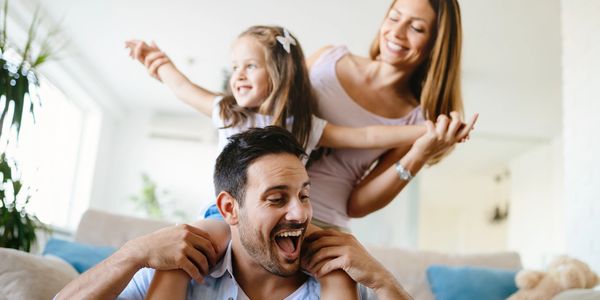 Young family smiling together