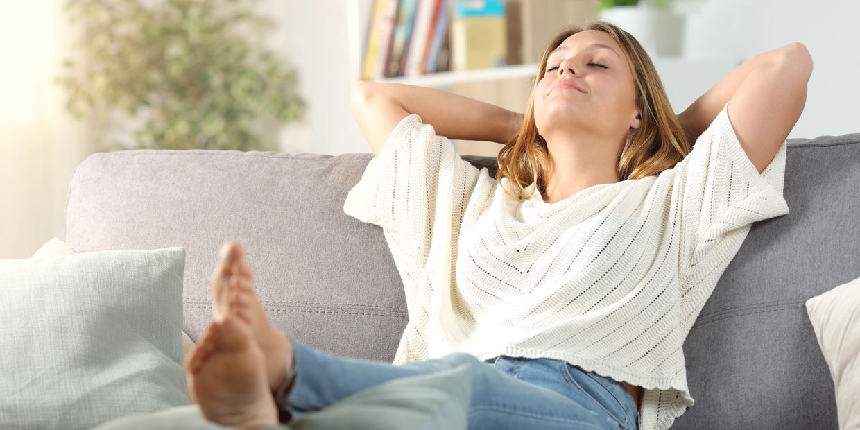 Woman kicked back and relaxing in home