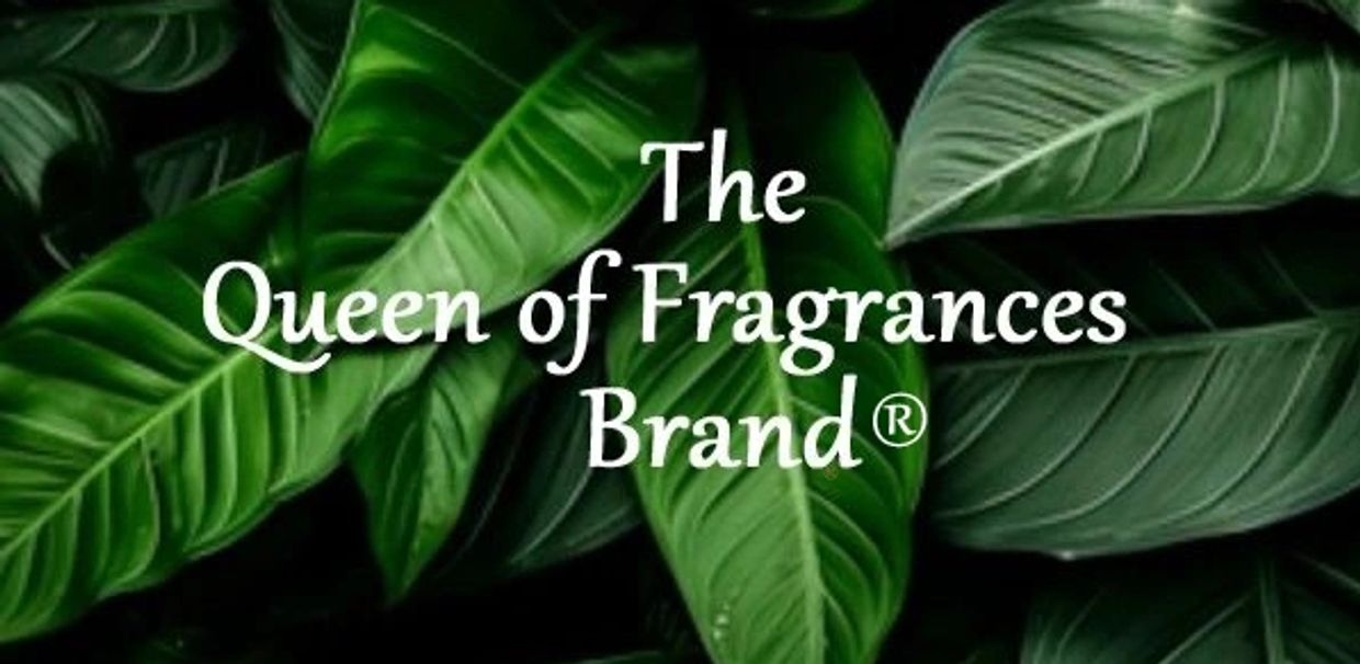 Text overlay on green leaves reads 'The Queen of Fragrances Brand®'.