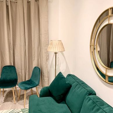 emerald green sofa